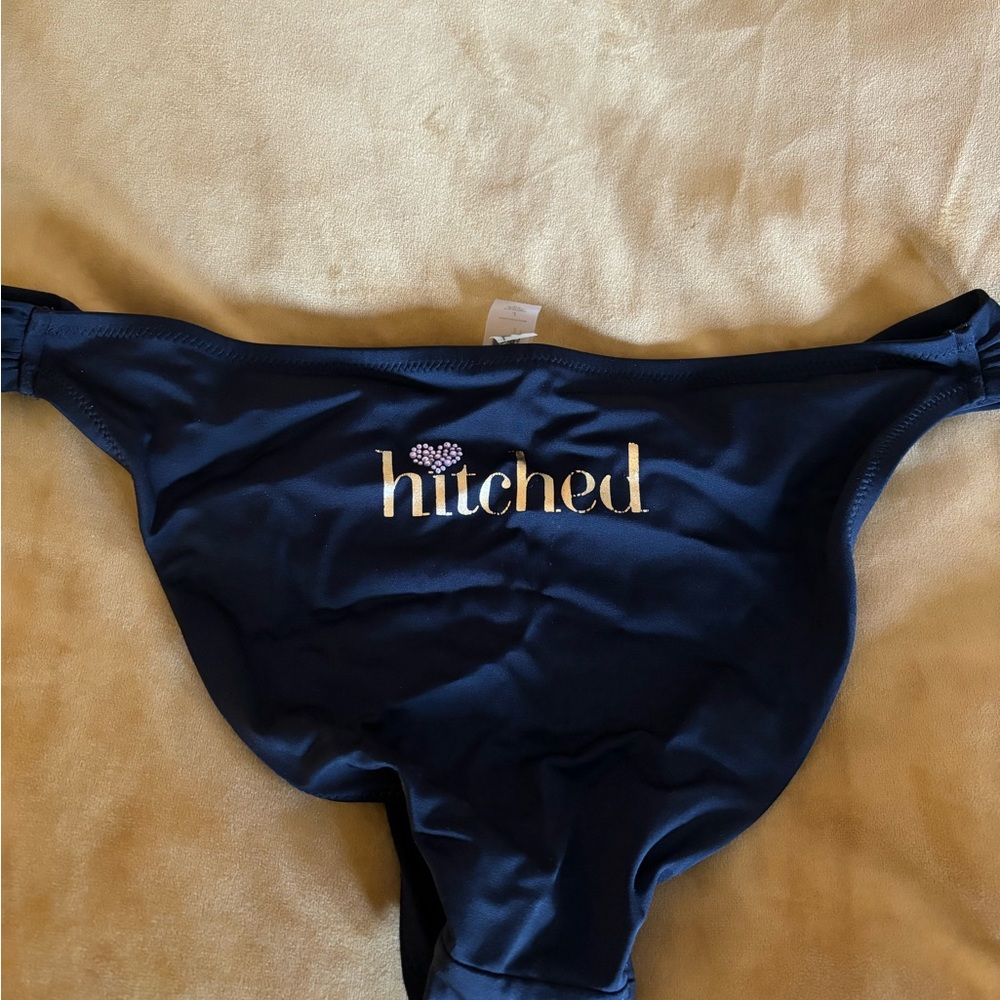 Victorias Secret “Hitched” swim bottoms.